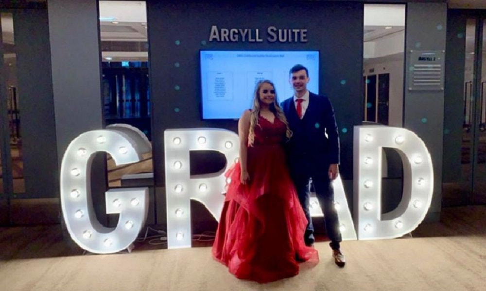 A client wearing a grad ball dress to her graduation ball in 2019. 